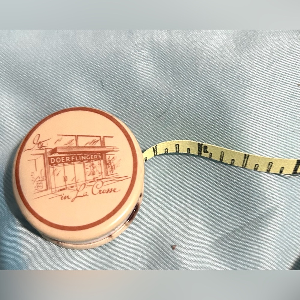Antique Cloth sewing tape measure advertising La Crosse, WI Doerflingers